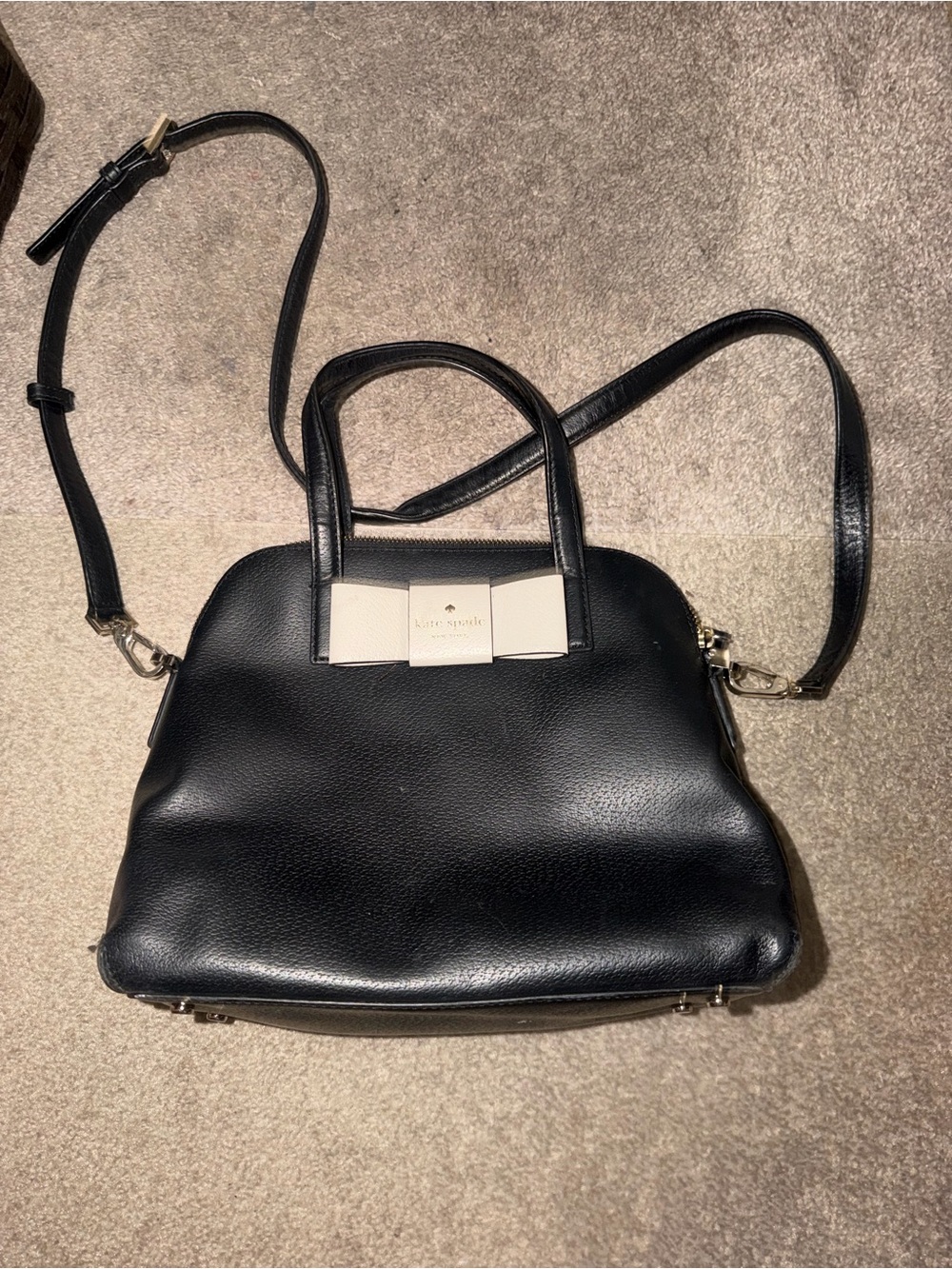 kate spade black leather satchel with cream bow detail